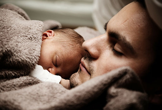 Baby and dad sleeping